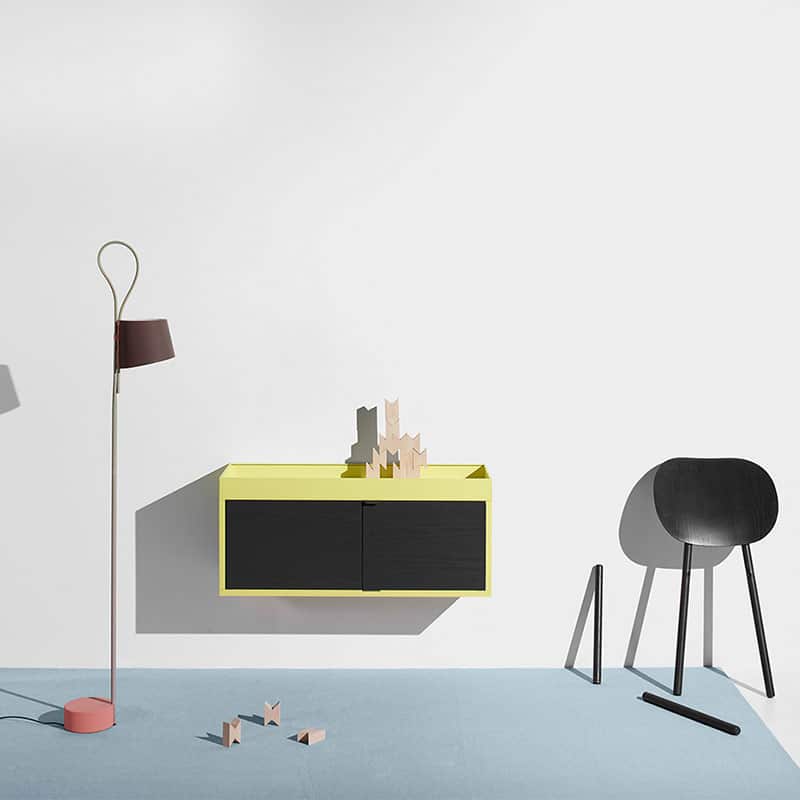 Minimalist room with modern furniture and decor.