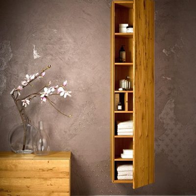 Wooden cabinet and flowers in minimalist room.