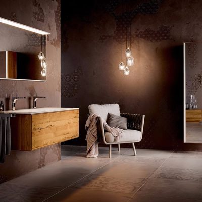 Modern bathroom with wooden vanity and chair.