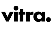 Silhouette of a person standing with cane.