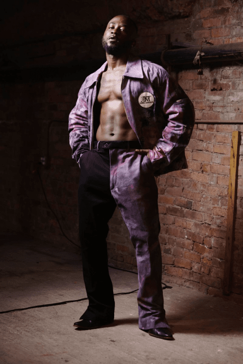 Man modeling in stylish two-tone outfit.