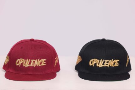 Red and black caps with "Opulence" embroidery.