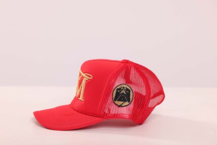 Red mesh cap with embroidered letter M.